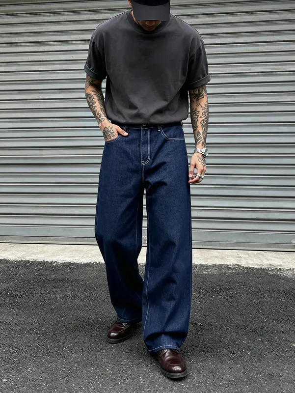 Denim Blue Dark Topstitched Wide-Leg Jeans Are the Same for Men and Women. They Are High-Waisted Loose and Floor-Length. They A