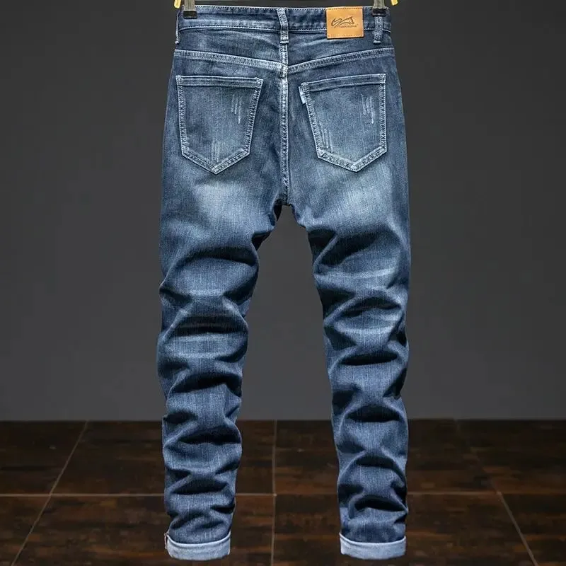 Jeans elastici larghi con giunture elastiche Pantaloni alla moda coreani autunnali da uomo Pantaloni in denim Harlan da uomo Jeans bootcut da uomo