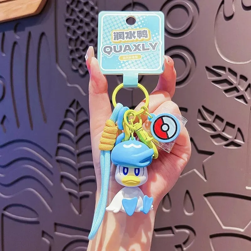 정품 포켓몬 키 체인 피카추 Gengar Sylveon Sprigatito Quaxly Fuecoco 애니메이션 액션 피규어 장난감 열쇠 고리 향수 펜던트