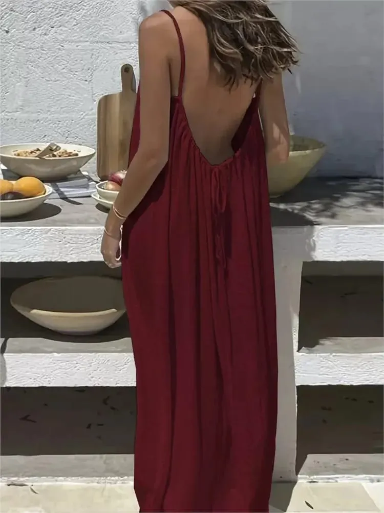 2026 Summer New Casual Seaside Vacation Women Long Skirt Fashionable Solid Color Sexy Suspender Backless Loose Dress Large Size — image 5