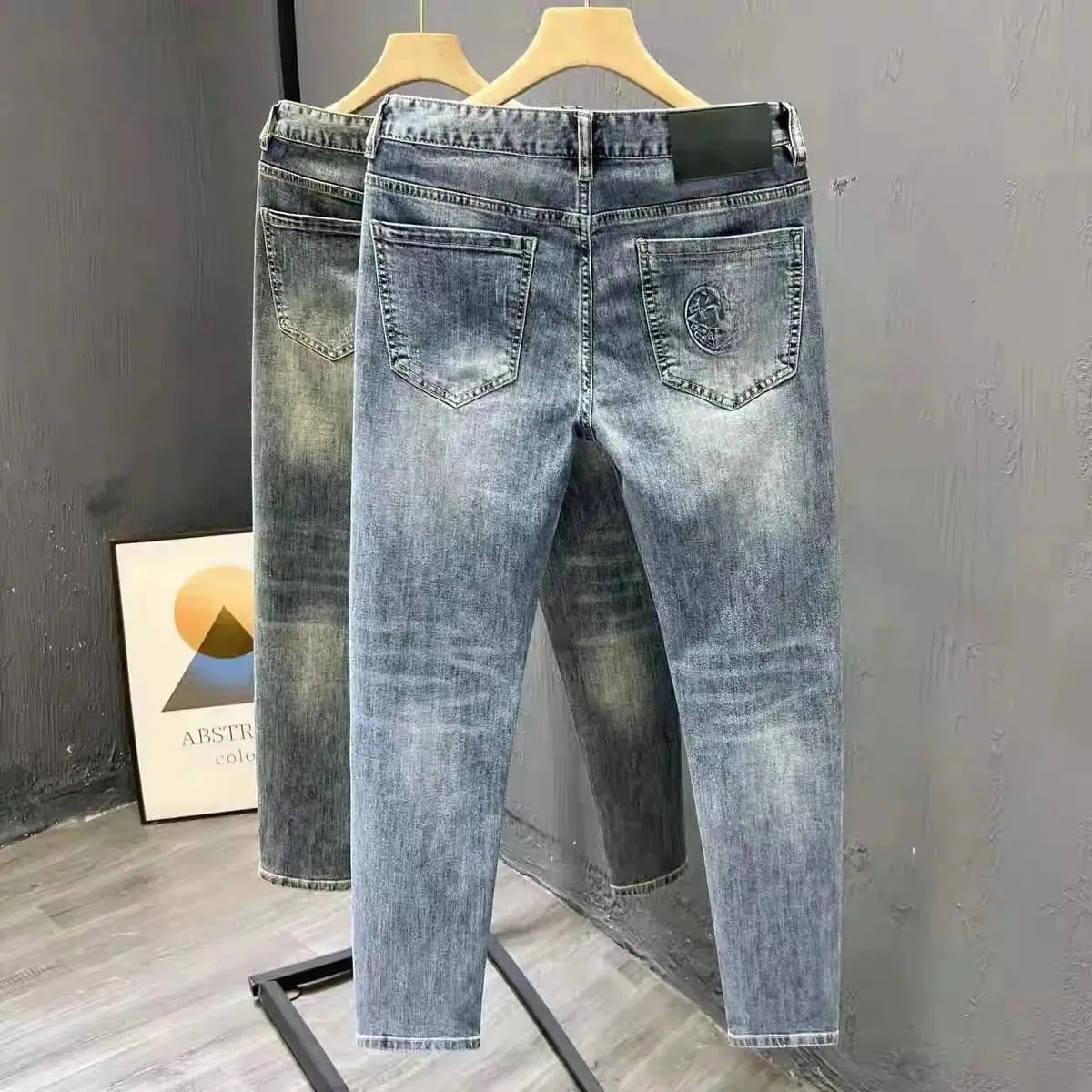 Korean Climate Lot Pants Light Luxury Trendy Brand Embossed Blue Jeans Men's Handsome Slim-fit Small Feet Elastic Trousers New