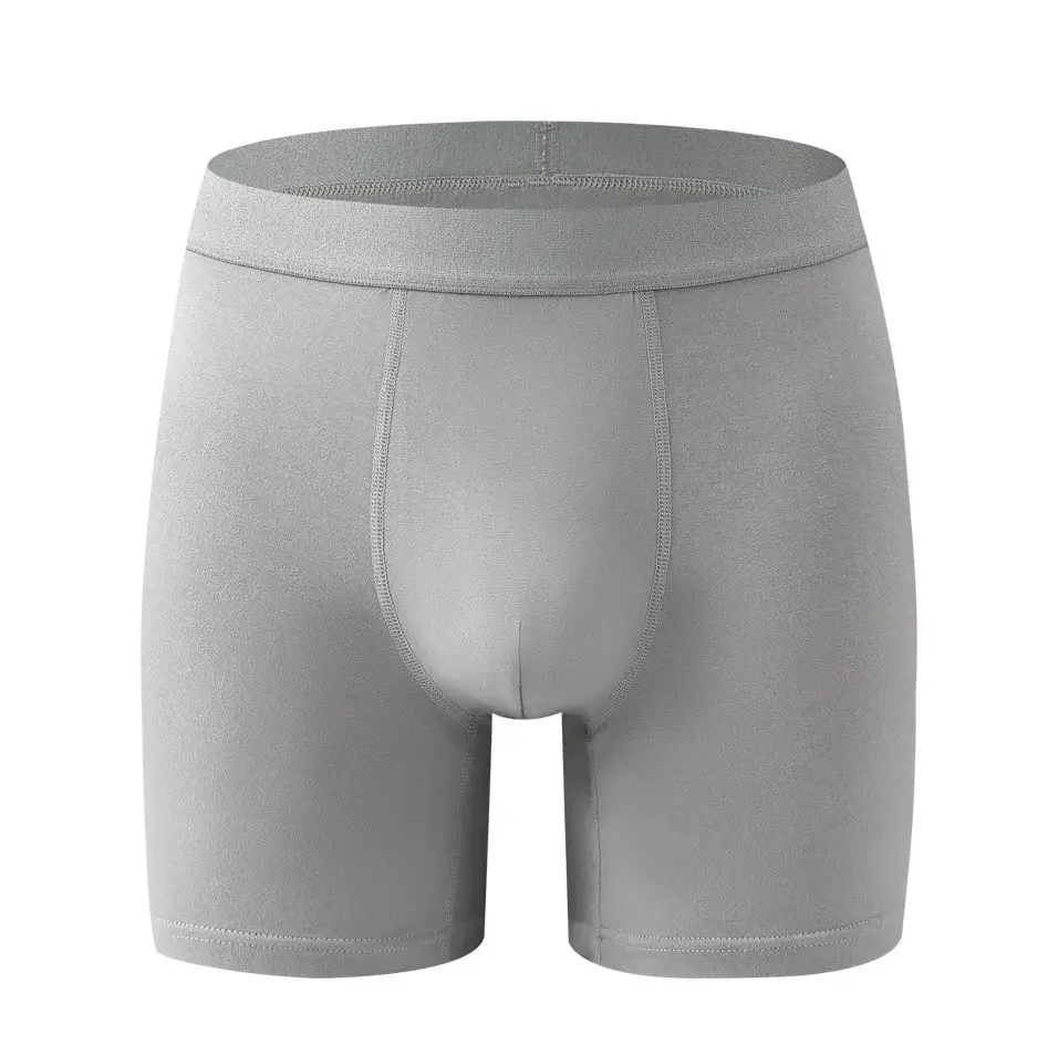 Calzoncillos tipo bóxer de fibra de bambú para hombre, ropa interior suave de color sólido de una sola pieza con cintura sin costuras y bolsa contorneada