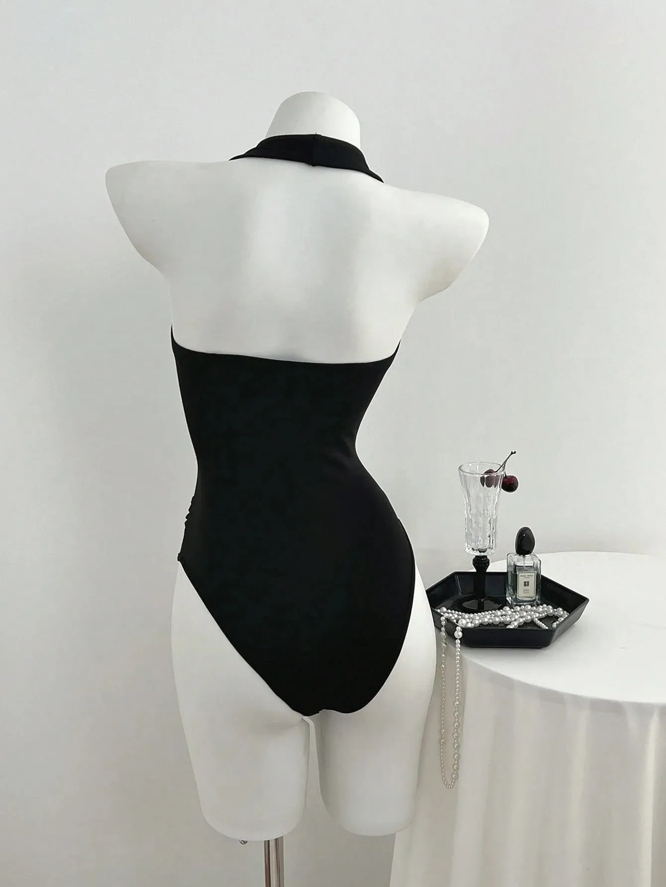 Women Halter Deep V Front Twist Knot Ruched Waist Bodysuit Solid Black Sleeveless Slim Fit Y2K Basic Jumpsuit Top
