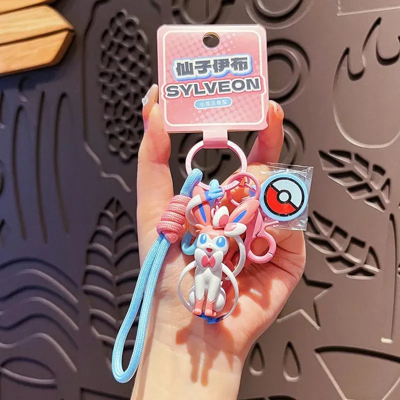 정품 포켓몬 키 체인 피카추 Gengar Sylveon Sprigatito Quaxly Fuecoco 애니메이션 액션 피규어 장난감 열쇠 고리 향수 펜던트