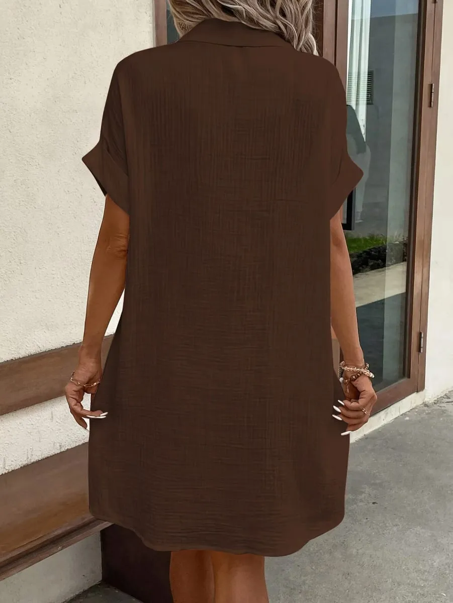 1 Solid-Color Collar Short-Sleeve Women's Dress with a Single Row of Buttons Simple and Convenient Pocket Design.