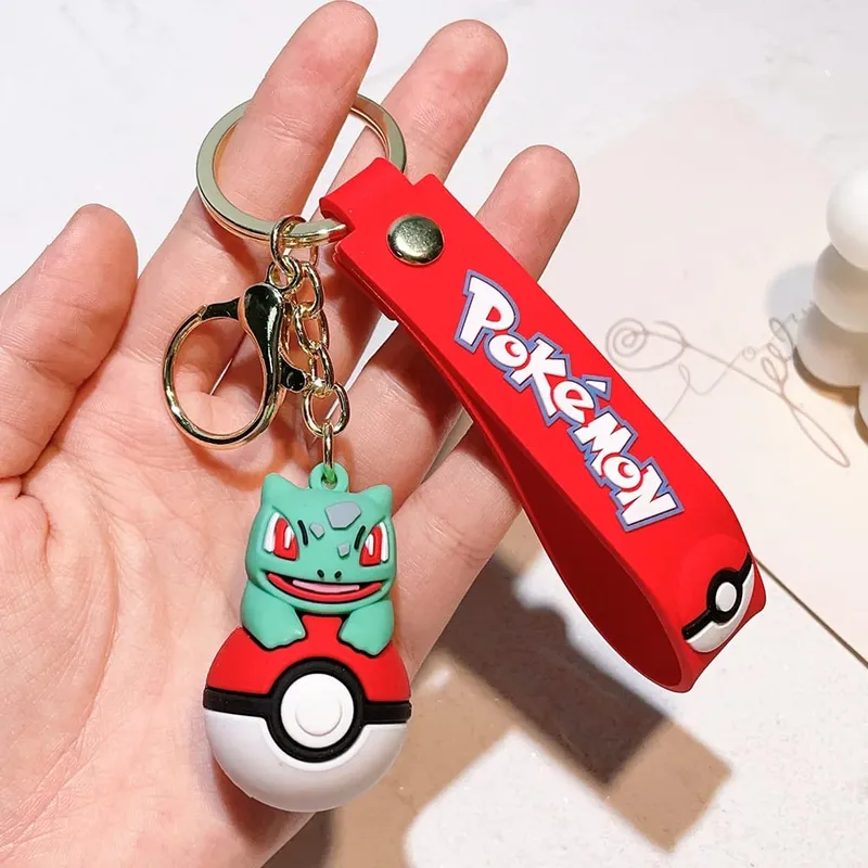 40 Style Wholesale Anime Pokémon Pikachu Eveen Keychain Cartoon Cute Charizard Keyring Student Backpack Car Key Chain Toys Gifts