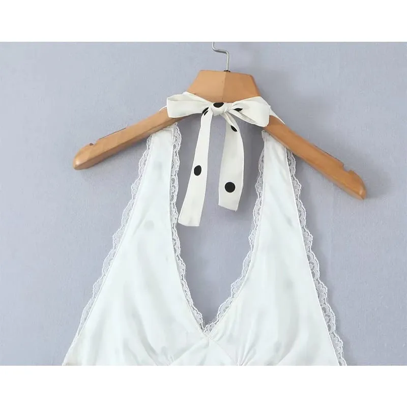 Vestido de encaje empalmado con lunares y cuello Halter para mujer, minivestido Sexy de corte a con espalda descubierta, bata de verano 2025
