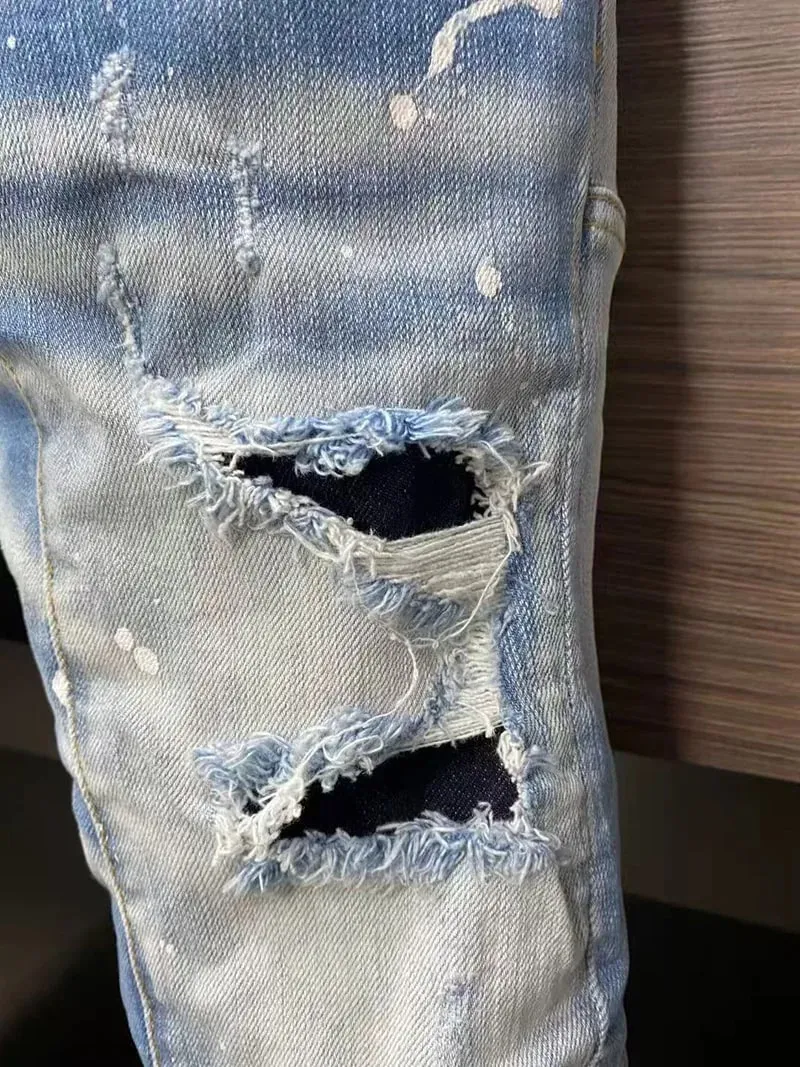 だぶだぶのジーンズ男性用パンツダメージ加工ジーンズトレンディなストリートスリムストレートレッグストレッチパンツメンズファッション