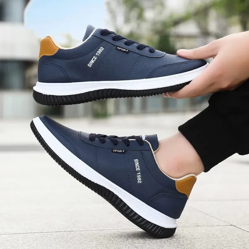 2026 Men Korean Style Leather Sneakers Autumn New Non Slip Shock Absorbing Training Shoes Lightweight Business Men Running Shoes