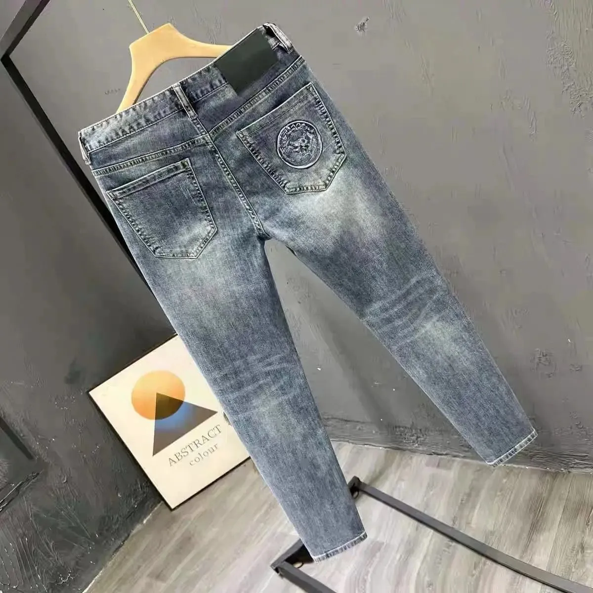 Korean Climate Lot Pants Light Luxury Trendy Brand Embossed Blue Jeans Men's Handsome Slim-fit Small Feet Elastic Trousers New