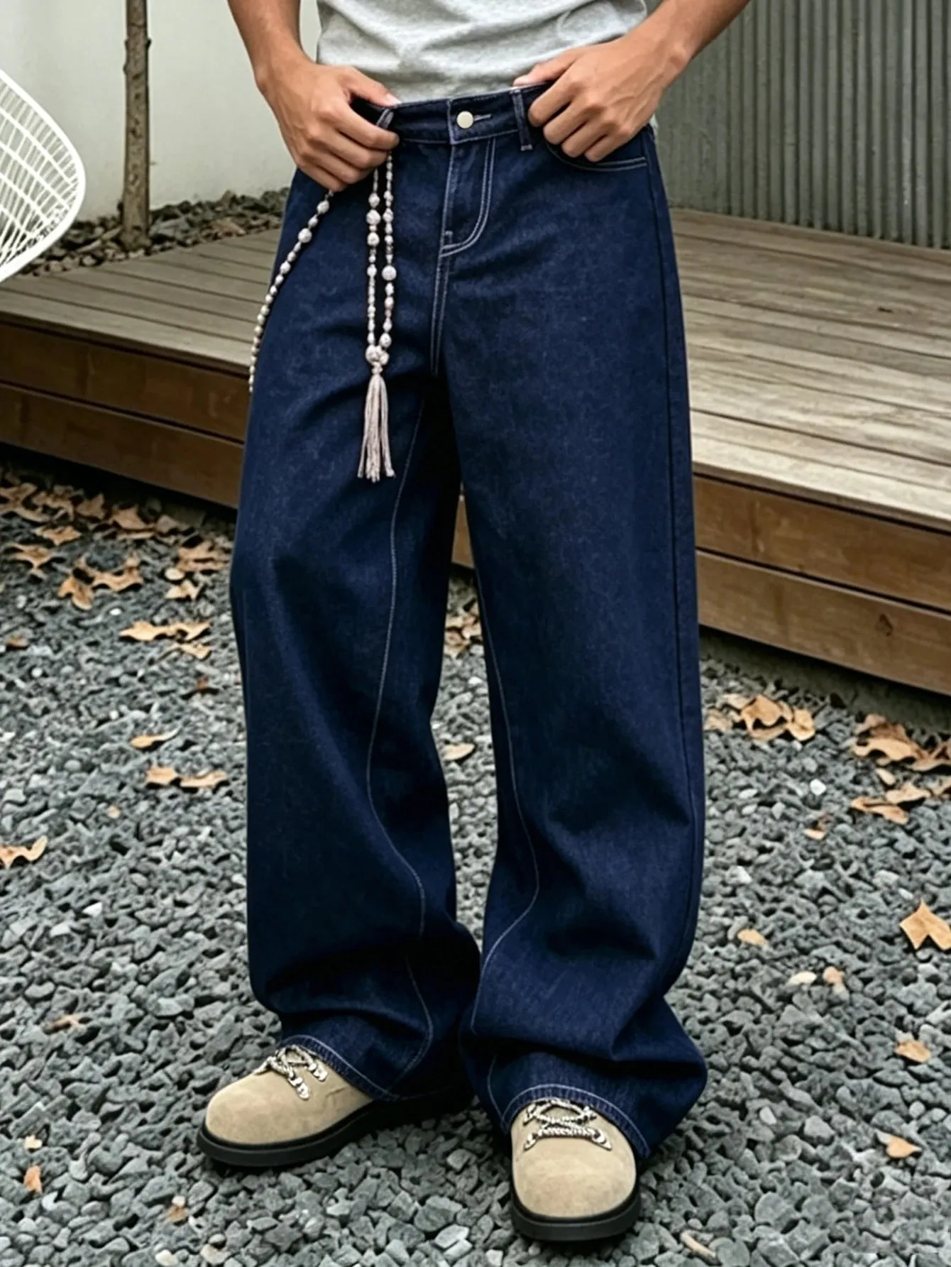 Denim Blue Dark Topstitched Wide-Leg Jeans Are the Same for Men and Women. They Are High-Waisted Loose and Floor-Length. They A