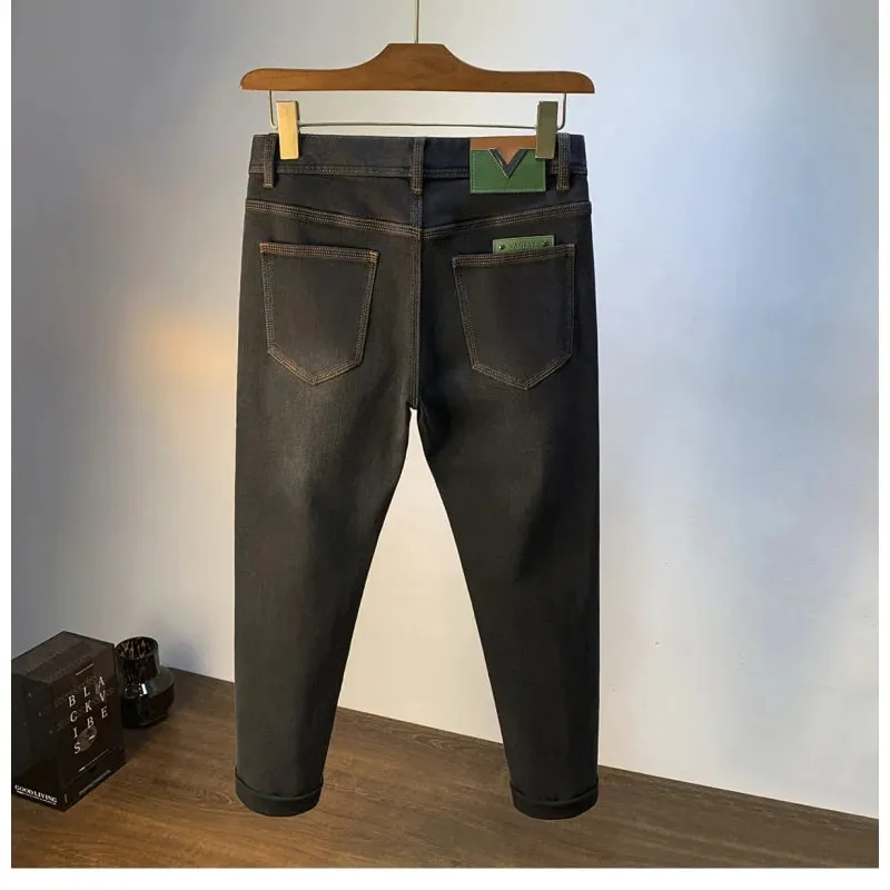 Light luxury high-end fashionable jeans for men in autumn 2025 thick and trendy casual slim fit elastic denim small leg pants