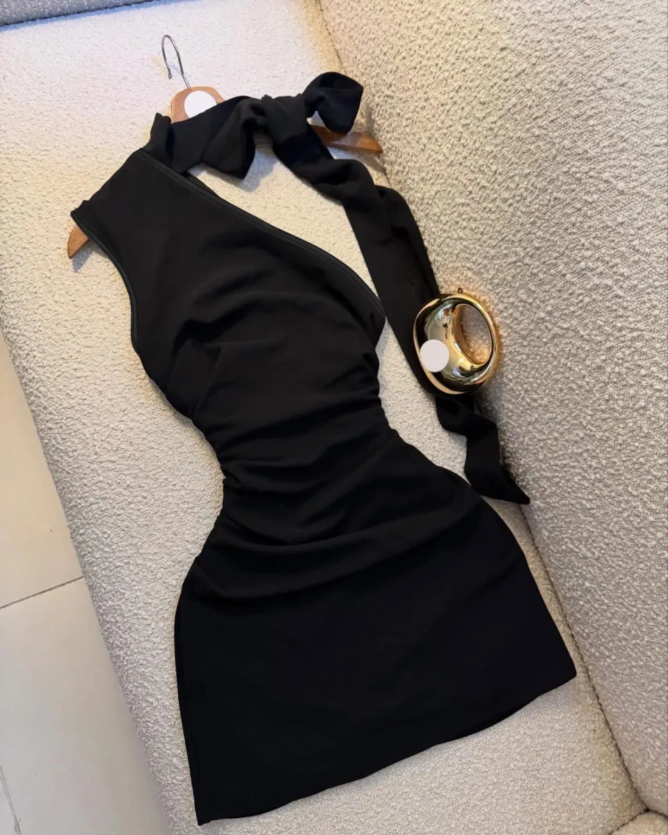 A Black One-Shoulder Halter-Neck Dress with a Bow Pleated and Fitted Short Dress Perfect for Everyday Outings and Attracting Attention a Sexy Little Black Dress for Dates