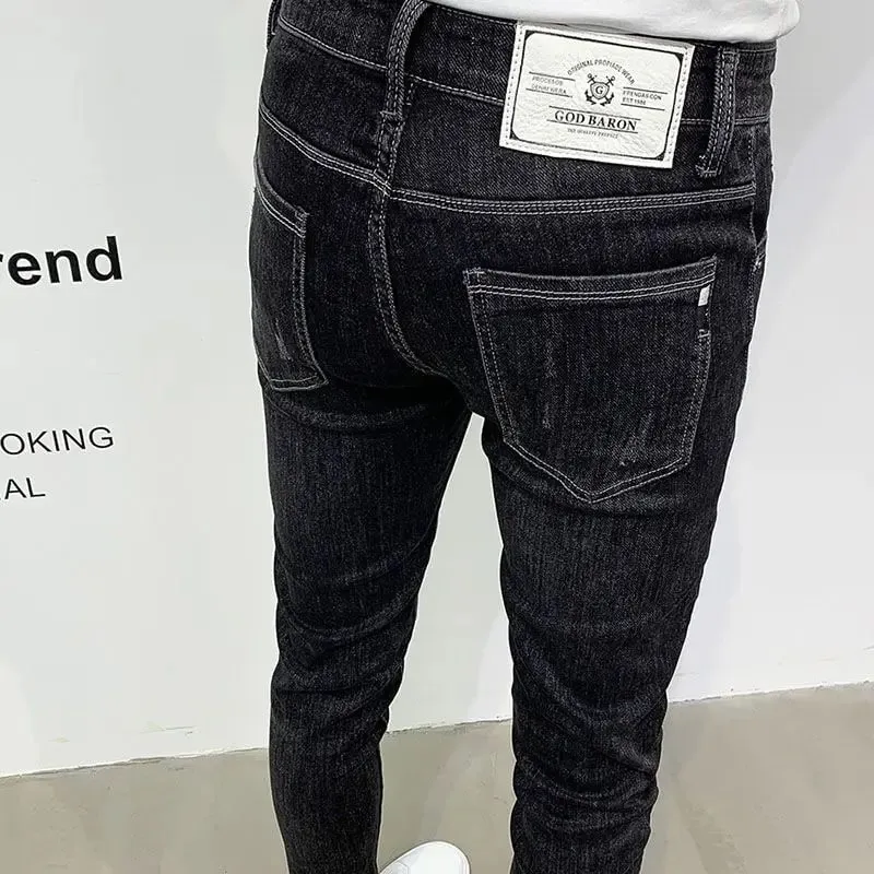 Nuevos pantalones vaqueros negros ajustados de estilo coreano para hombre con diseño bordado, pantalones vaqueros para ropa informal y de lujo, pantalones elásticos