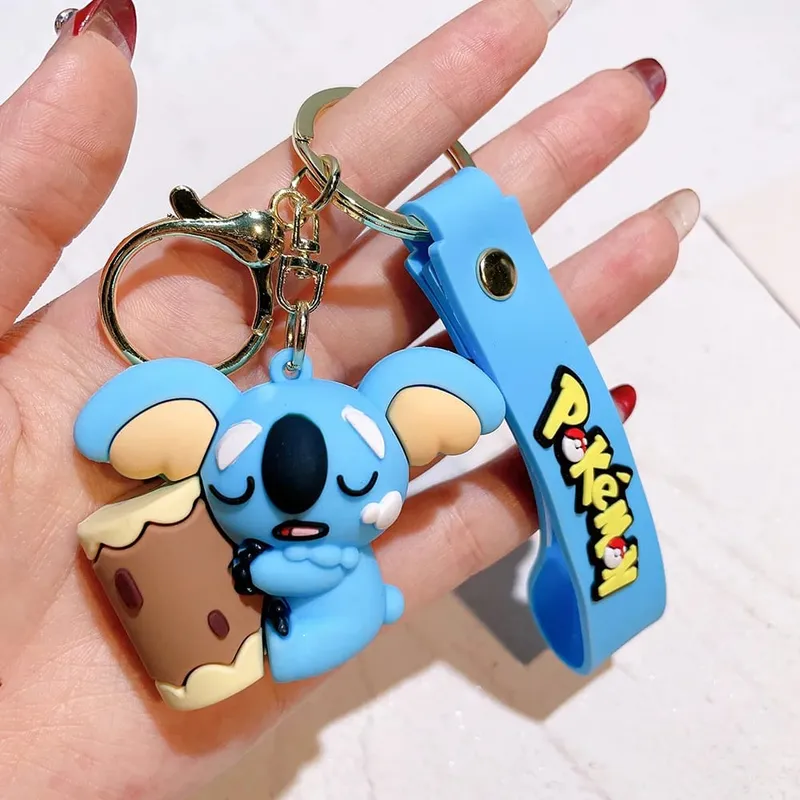 40 Style Wholesale Anime Pokémon Pikachu Eveen Keychain Cartoon Cute Charizard Keyring Student Backpack Car Key Chain Toys Gifts