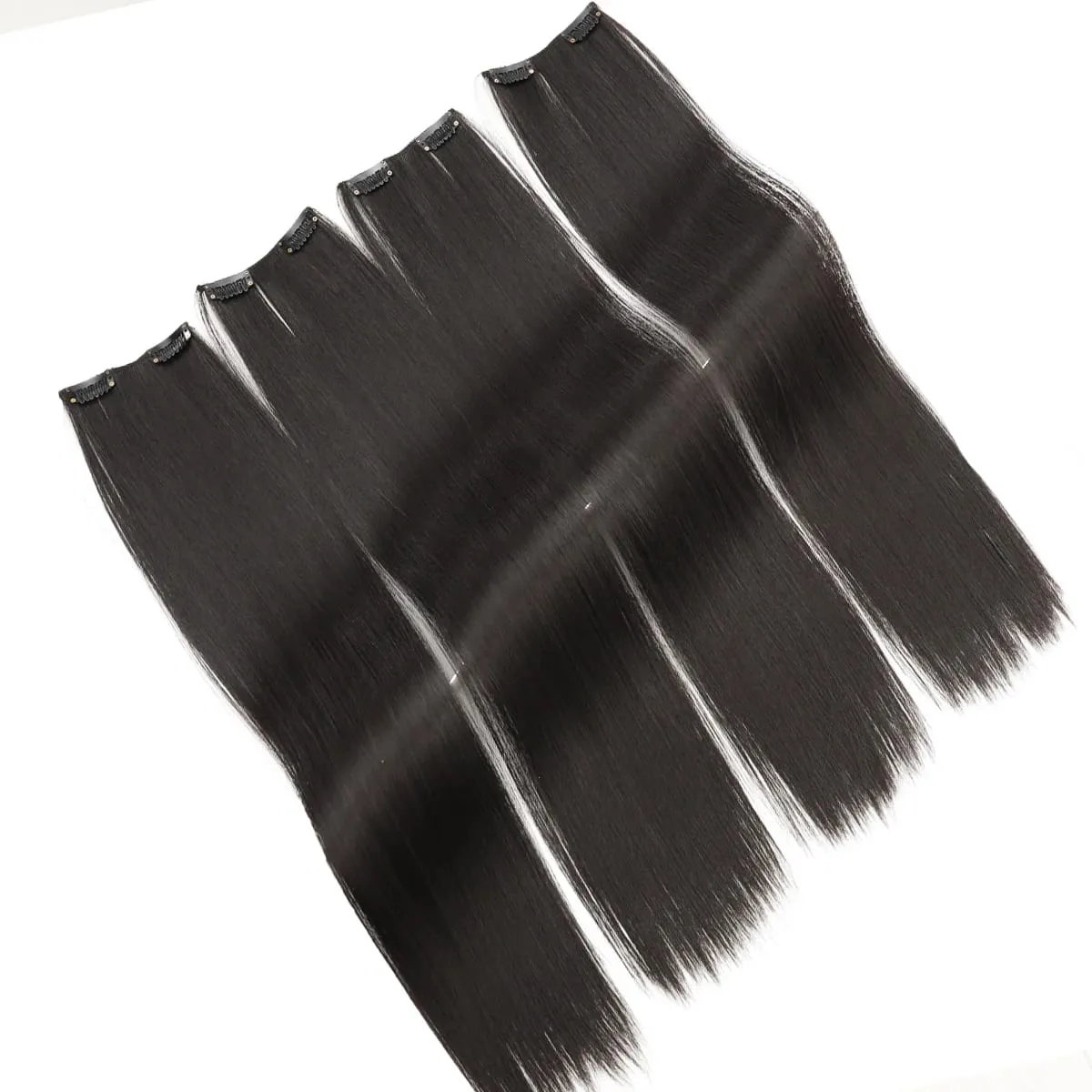 4PCS synthetic hair extension piece long straight hair wig clip heat-resistant wig piece extension on a woman's hair