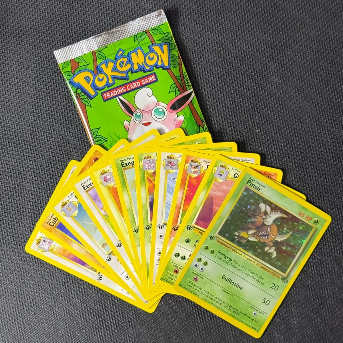 بطاقات وكيل البوكيمون حزمة معززة الغابة الإصدار الأول 11 بطاقة/حزمة Flareon Scyther Wigglytuff حقيبة هدايا بطاقة TCG