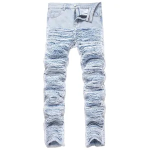Heren lichtblauwe denim jeans met franjes, gescheurd, verdrietig, vernietigd, streetwear broek met patches, patchwork, loszittende broek