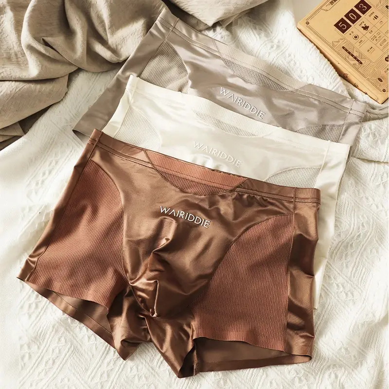 Lujosa ropa interior de seda helada tipo satén fresca transpirable de malla de doble cara para hombre bragas altas elásticas sin costuras lencerías para hombre pantalones cortos